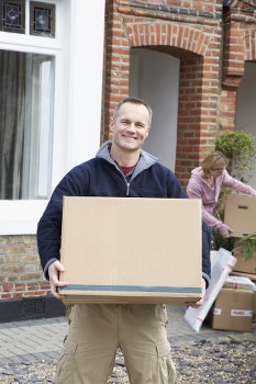 Commercial movers handling office boxes and desks in Richmond area