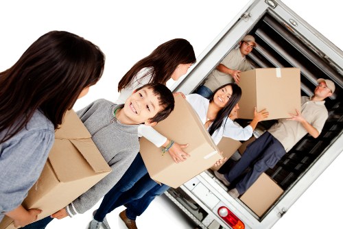 Man with a van loading furniture in Richmond upon Thames