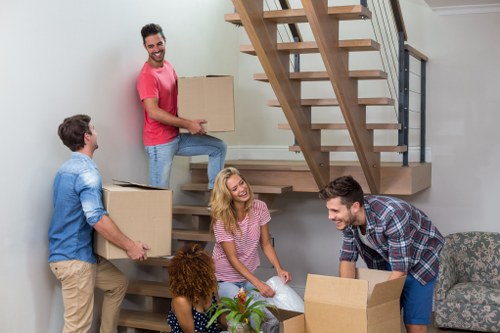 Packed boxes and furniture ready for transport in a Richmond home