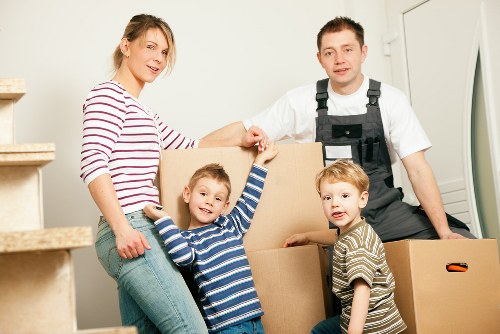 Local moving team preparing packed items for transport in Richmond upon Thames