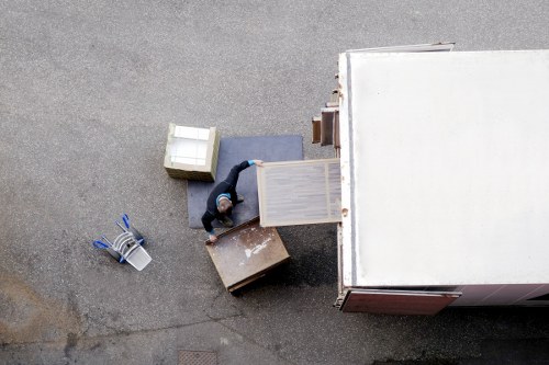 Furniture being carefully transported during a local relocation